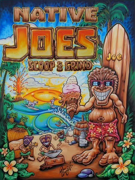 Tiki character holds ice cream near beach with surfboards and palm trees.